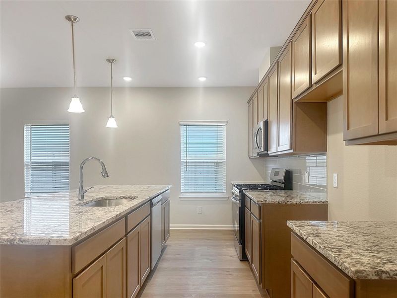 The Crawford- Kitchen. Home is under construction, photos used for illustration only; actual features, colors, and upgrades may vary. The Crawford- Kitchen. Home is under construction, photos used for illustration only; actual features, colors, and upgrades may vary.