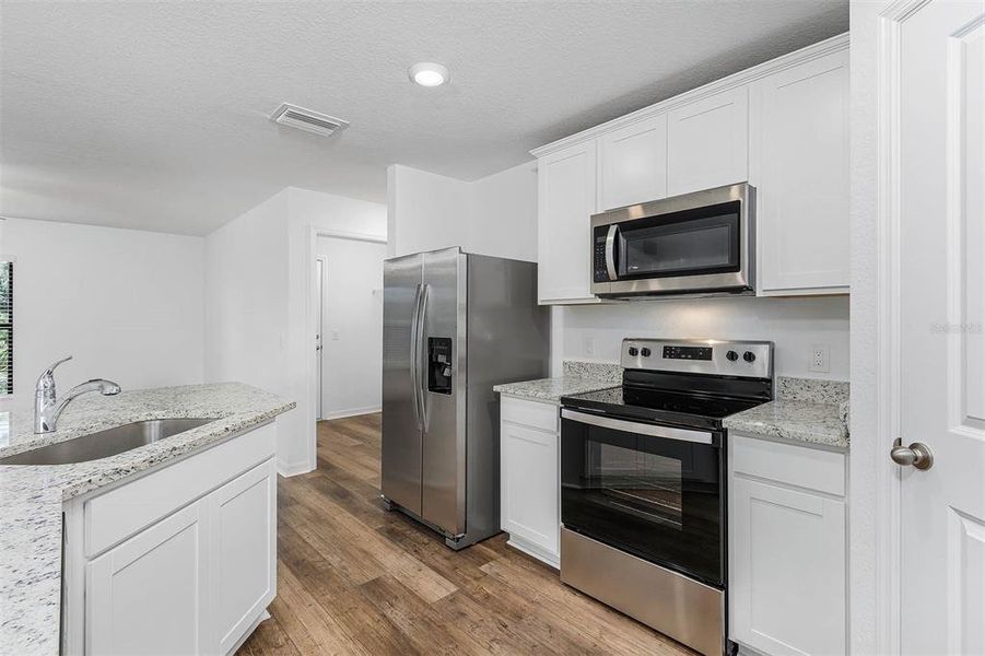 Furnished interior view inside a new home in , Port Charlotte (Image 7).