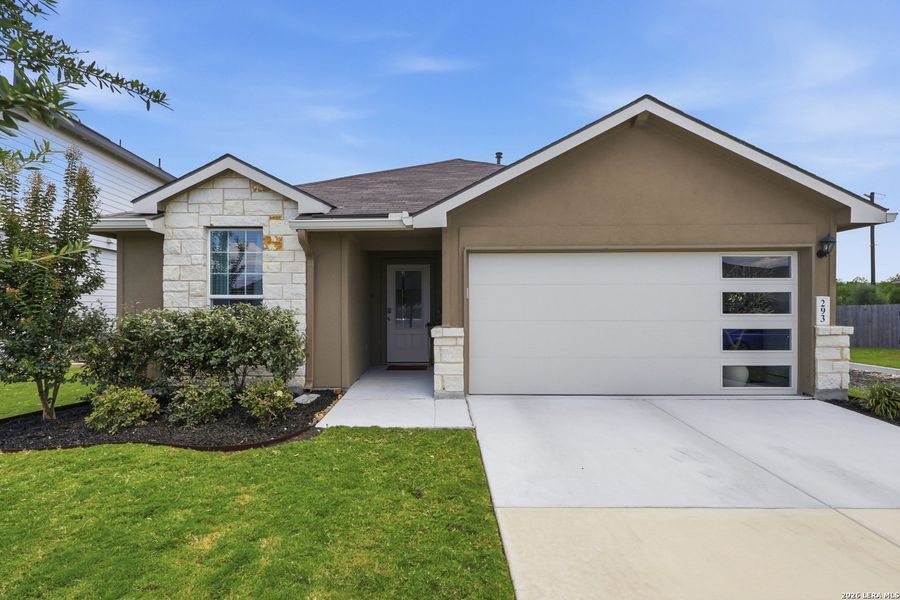 Front exterior of a new home in Redbird Ranch, San Antonio, TX, highlighting curb appeal (Image 28).