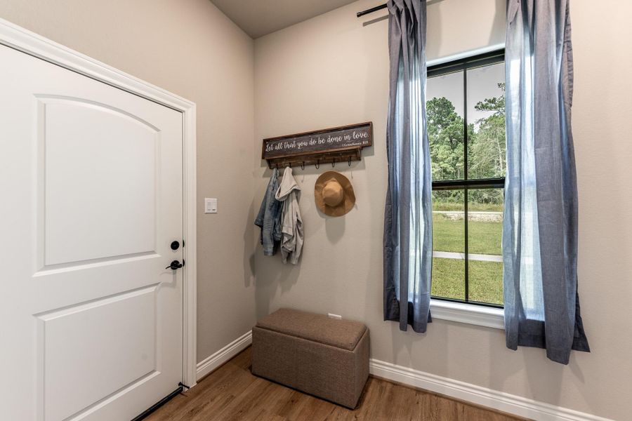 Door to garage enter into large laundry room area