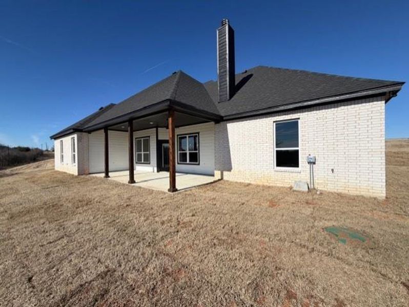 Exterior details and patio area of a home in , Azle (Image 3).