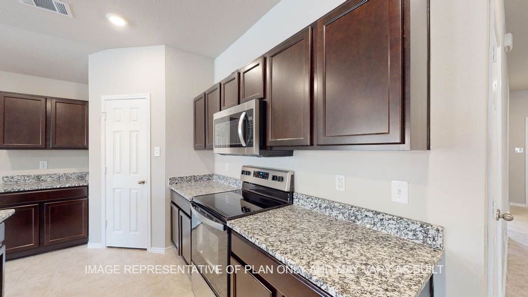 Representative furnished interior of a home built from the Texas Cali by D.R. Horton in Victory Ranch, Killeen (Image 5).