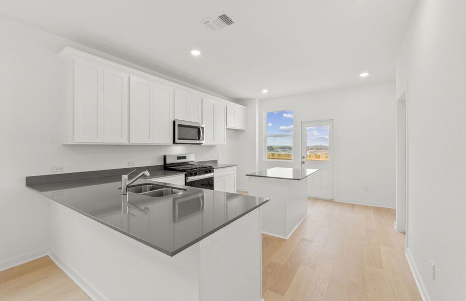 Furnished interior view inside a new home in Larson Crossing, Elgin (Image 7).