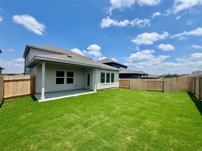 Exterior details and patio area of a home in Big Sky Ranch - Reserve Collection, Dripping Springs (Image 2). Exterior details and patio area of a home in Big Sky Ranch - Reserve Collection, Dripping Springs (Image 2).