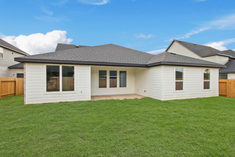 Front exterior of a new home in Silverthorne, Conroe, TX, highlighting curb appeal (Image 2). Front exterior of a new home in Silverthorne, Conroe, TX, highlighting curb appeal (Image 2).