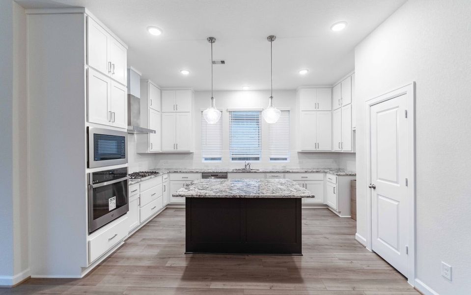 Furnished interior view inside a new home in Marvida, Cypress (Image 6).