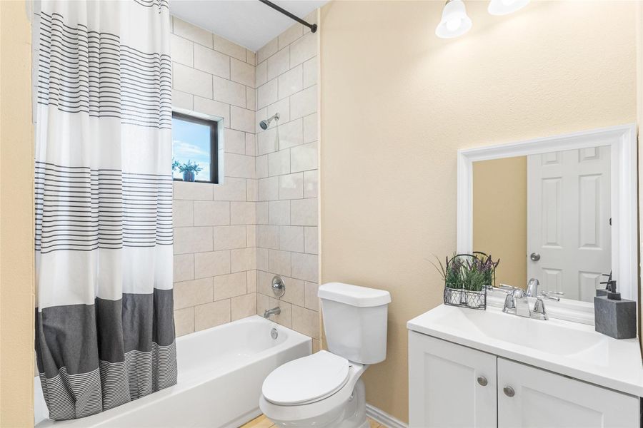 Bathroom located in the hallway Bathroom located in the hallway