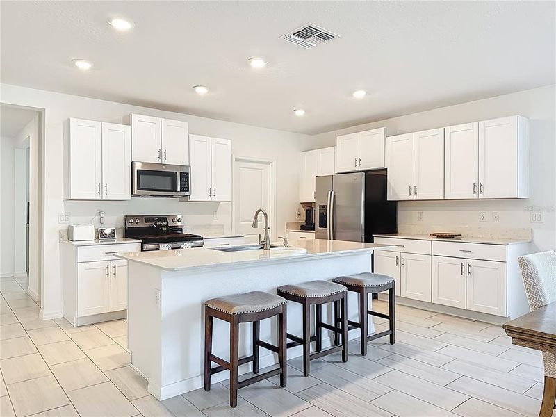 Furnished interior view inside a new home in Berry Bay: The Executives, Wimauma (Image 50).