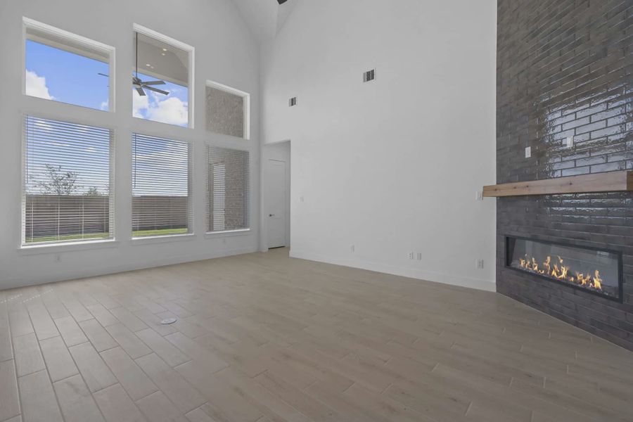 Representative unfurnished interior of a home built from the Waterford by Chesmar Homes in Meridiana 60's, Manvel (Image 25).