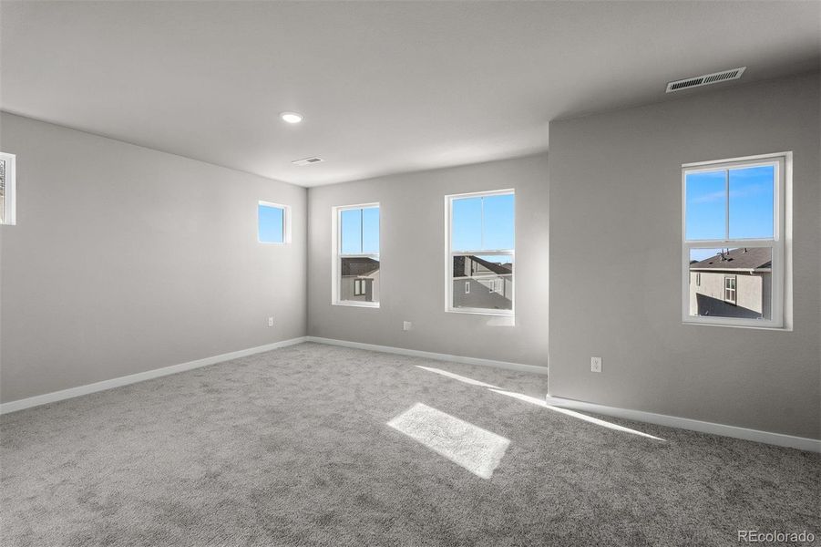 Spacious, unfurnished interior of a new home in Revel Crossing at Wolf Ranch – The Ascent Collection, Colorado Springs (Image 16).