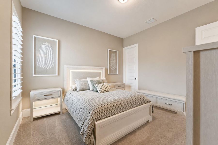 The secondary bedrooms are generously sized and thoughtfully designed with comfort, privacy, and flexibility in mind — perfect for family, guests, or additional workspace needs.