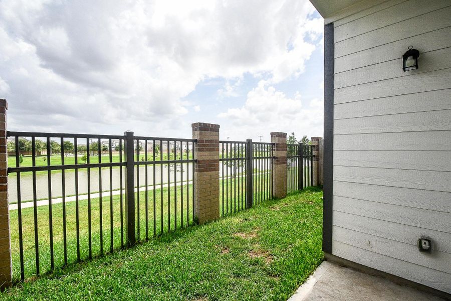 Exterior details and patio area of a home in Spring Brook Village - City Series, Houston (Image 2). Exterior details and patio area of a home in Spring Brook Village - City Series, Houston (Image 2).