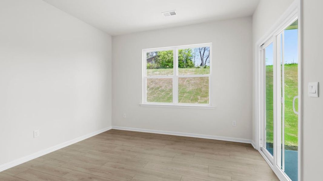 Spacious, unfurnished interior of a new home in Durbin Meadows Traditions, Fountain Inn (Image 22).