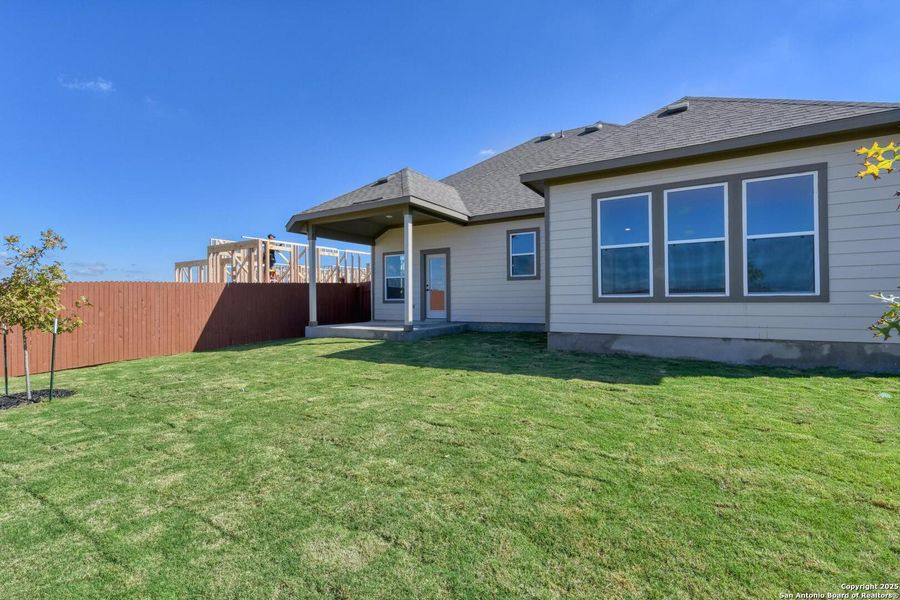 Exterior details and patio area of a home in Megan's Landing 50's, Castroville (Image 2).
