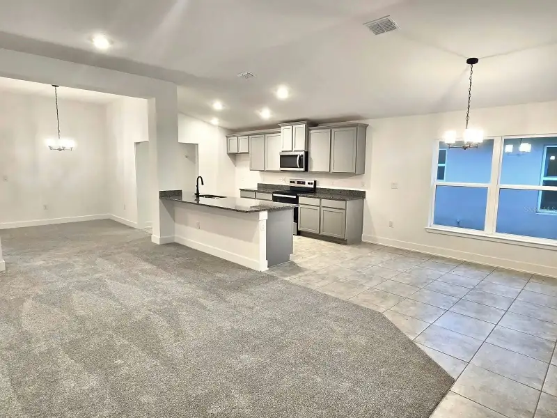 Furnished interior view inside a new home in Harmony Central, Harmony (Image 4).
