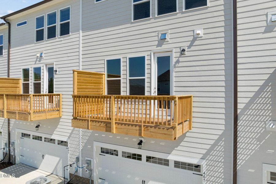Exterior details and patio area of a home in Forestville Yard Townhomes, Knightdale (Image 3).