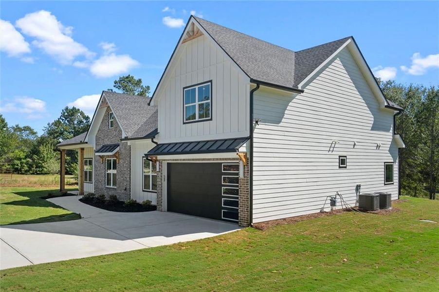 Front exterior of a new home in , Powder Springs, GA, highlighting curb appeal (Image 33).