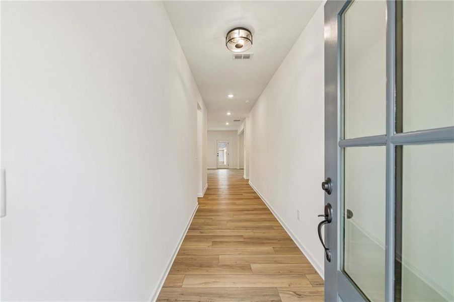 Spacious, unfurnished interior of a new home in Eastlyn Crossing, Flowery Branch (Image 16).