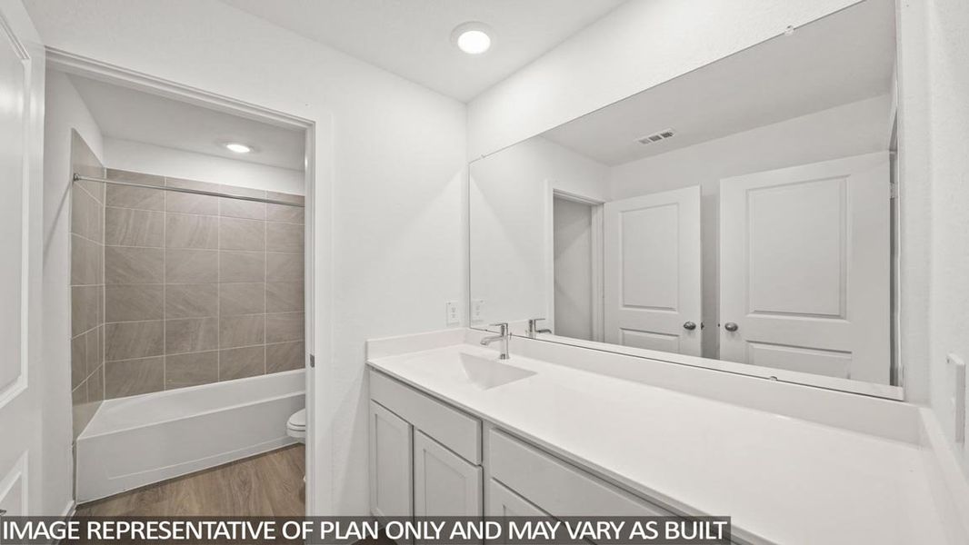 Furnished interior view inside a new home in New Waverly Station, New Waverly (Image 8).