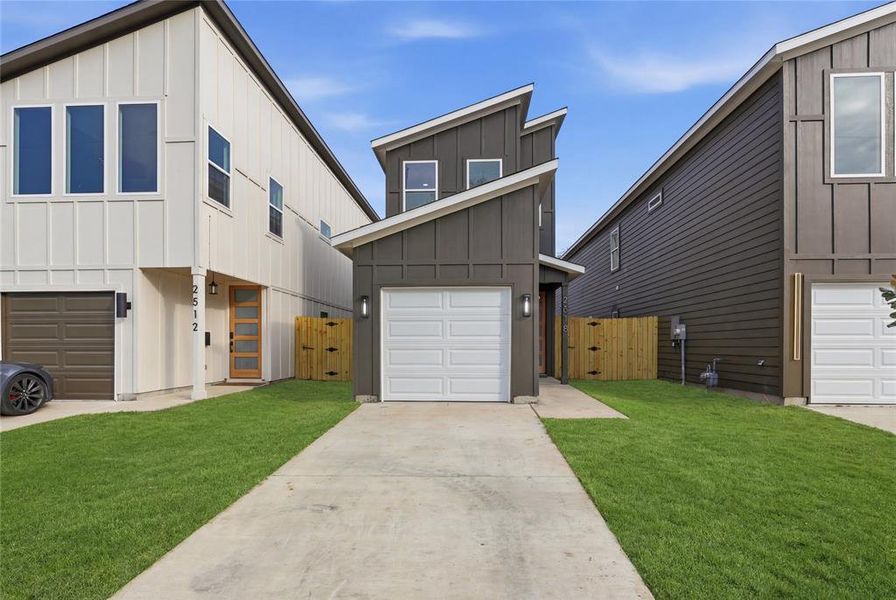 Front exterior of a new home in , Dallas, TX, highlighting curb appeal (Image 21).