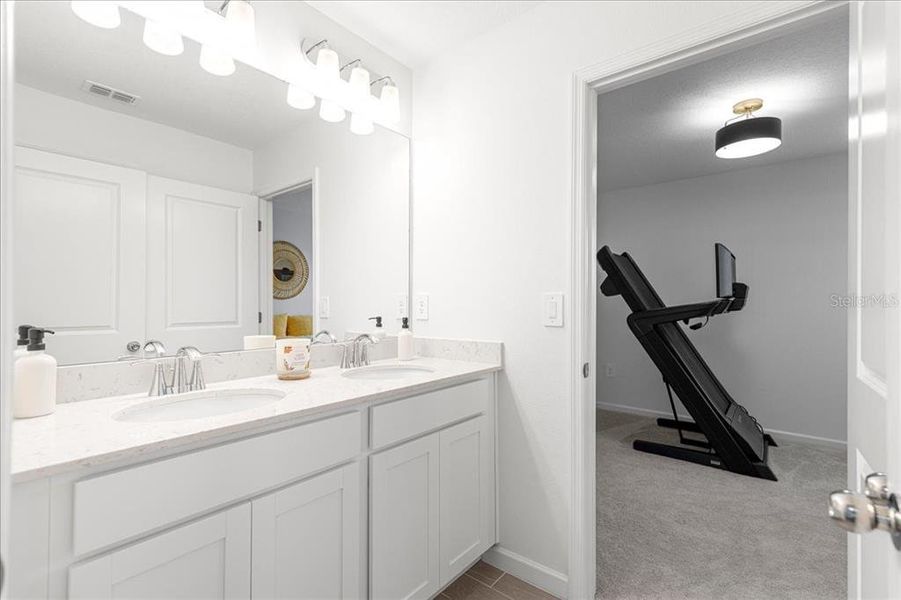 Furnished interior view inside a new home in Millwood: Millwood Estates - The Enclave, Ocala (Image 18). Furnished interior view inside a new home in Millwood: Millwood Estates - The Enclave, Ocala (Image 18).