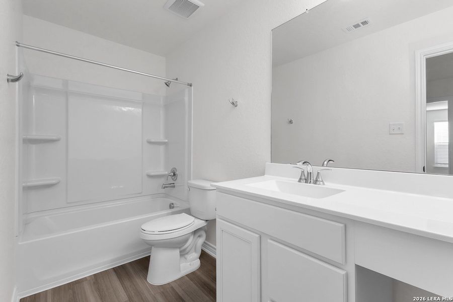 Furnished interior view inside a new home in Preserve at Culebra - Heritage Collection, San Antonio (Image 4).