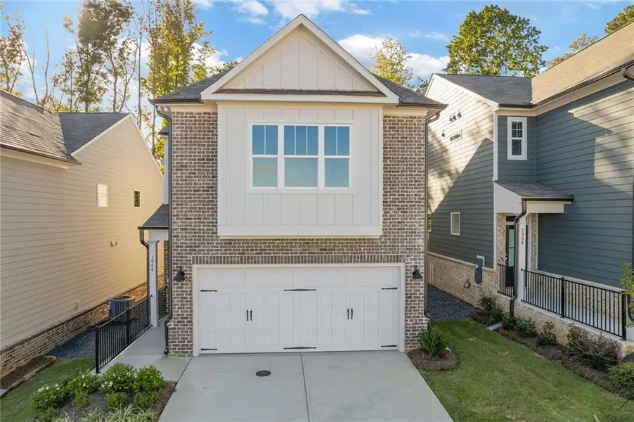 Front exterior of a new home in , Dacula, GA, highlighting curb appeal (Image 16). Front exterior of a new home in , Dacula, GA, highlighting curb appeal (Image 16).
