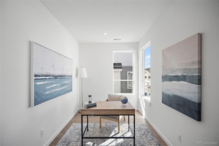 Furnished interior view inside a new home in The Commons at Victory Ridge, Colorado Springs (Image 28).