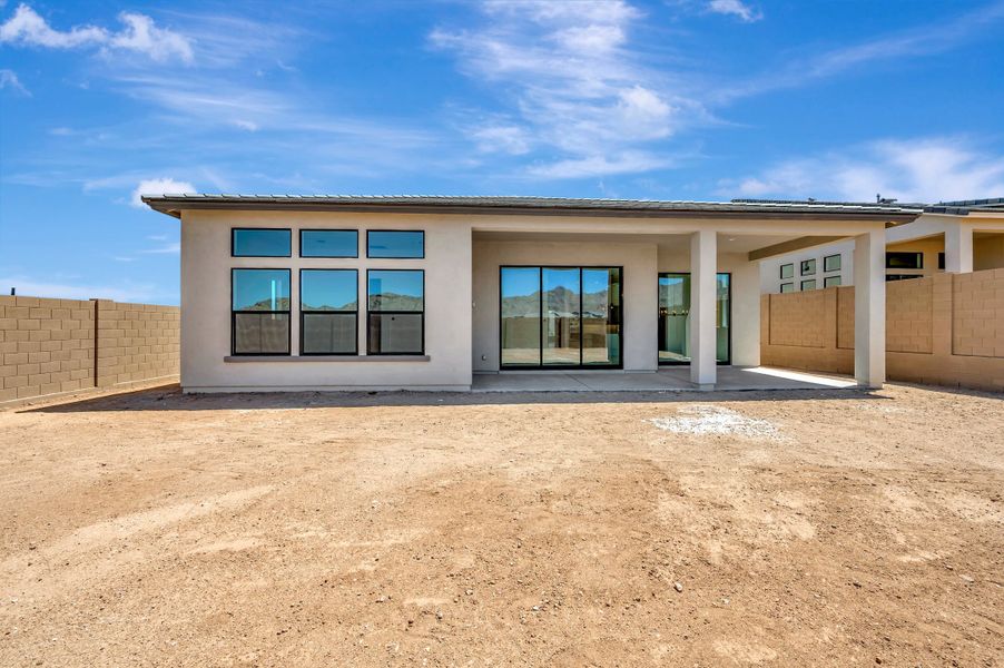 Exterior details and patio area of a home in Overlook at Verrado Regent Hills, Buckeye (Image 4).