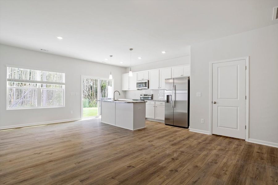Furnished interior view inside a new home in West Main Townhomes, Sanford (Image 5).