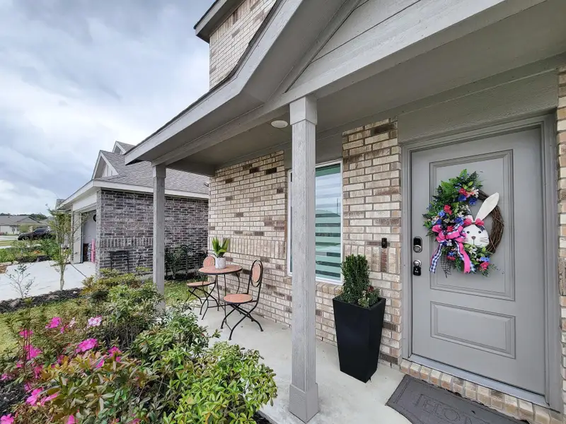 Exterior details and patio area of a home in Tavola, New Caney (Image 3).