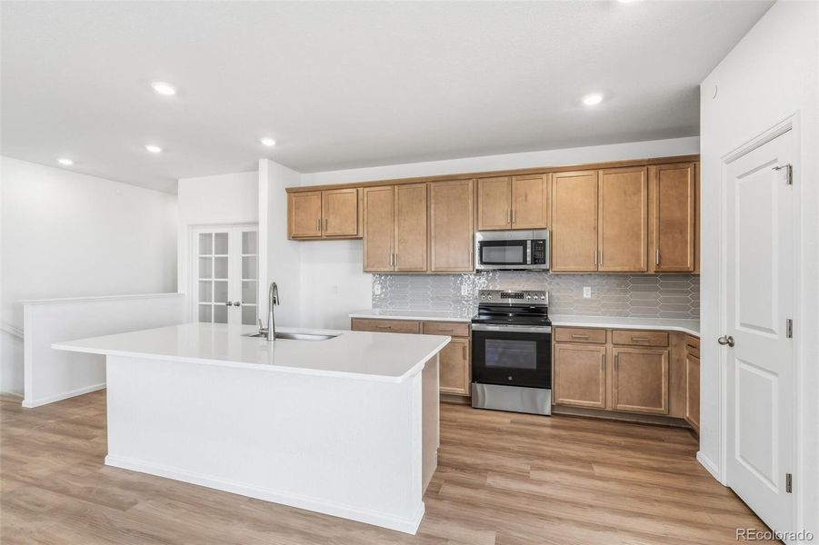 Furnished interior view inside a new home in Legato, Commerce City (Image 10).