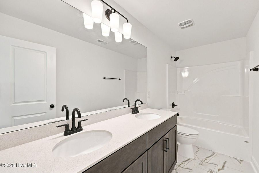 Furnished interior view inside a new home in Legacy Lakes, Aberdeen (Image 13).