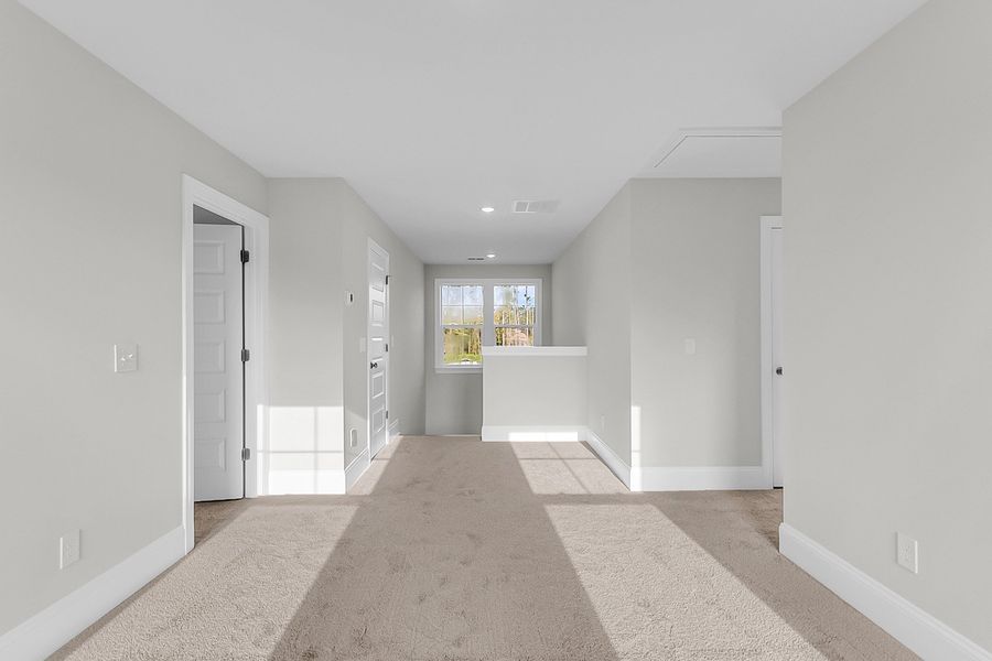 Spacious, unfurnished interior of a new home in Pineland Preserve, Summerville (Image 36).