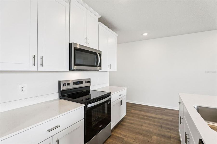 Furnished interior view inside a new home in The Meadow at Crossprairie Bungalows, St. Cloud (Image 10).