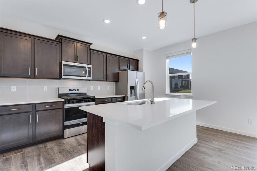Furnished interior view inside a new home in Trails at Crowfoot, Parker (Image 7).