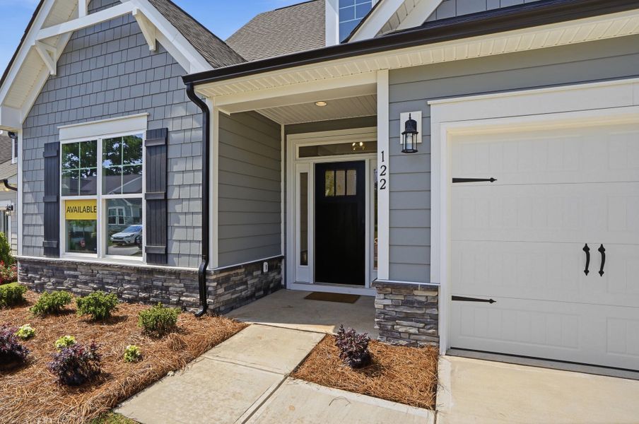 Exterior details and patio area of a home in Villas at Prestwick, Mooresville (Image 2).