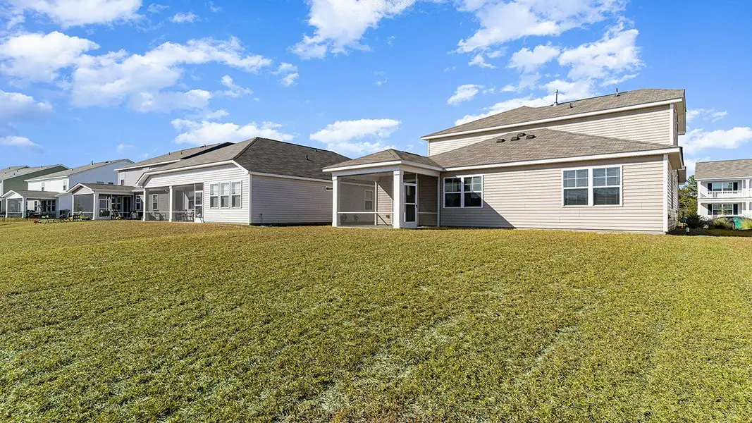 Representative exterior photo of a completed home built from the BELFORT by D.R. Horton in Heron Pointe, Myrtle Beach, SC (Image 18). Representative exterior photo of a completed home built from the BELFORT by D.R. Horton in Heron Pointe, Myrtle Beach, SC (Image 18).
