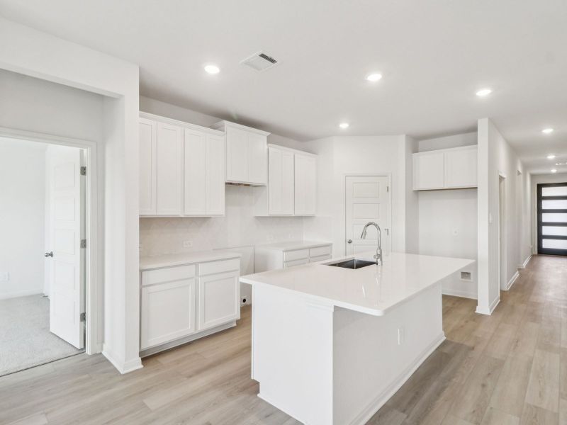 Kitchen in the Callaghan floorplan at a Meritage Homes community. Kitchen in the Callaghan floorplan at a Meritage Homes community.