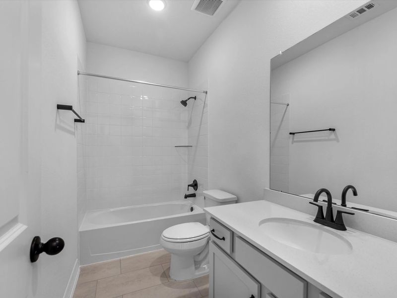 Secondary bathroom. Sample product photo. Actual exterior and interior selections may vary by homesite. Photo may be virtually staged. Secondary bathroom. Sample product photo. Actual exterior and interior selections may vary by homesite. Photo may be virtually staged.