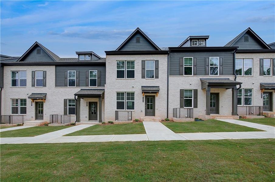 Front exterior of a new home in Daybreak, Newnan, GA, highlighting curb appeal (Image 16).