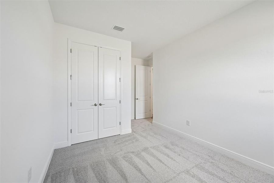 Spacious, unfurnished interior of a new home in Grand Park, Sarasota (Image 24).