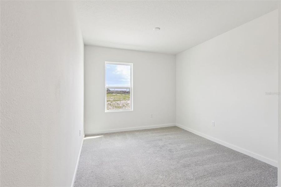Spacious, unfurnished interior of a new home in Willowbrook North, Winter Haven (Image 30).