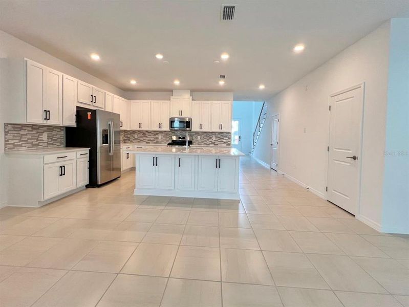 Furnished interior view inside a new home in , Winter Garden (Image 7).
