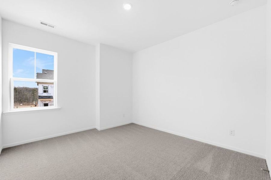 Spacious, unfurnished interior of a new home in Ridge at Sugar Creek, Indian Land (Image 14).