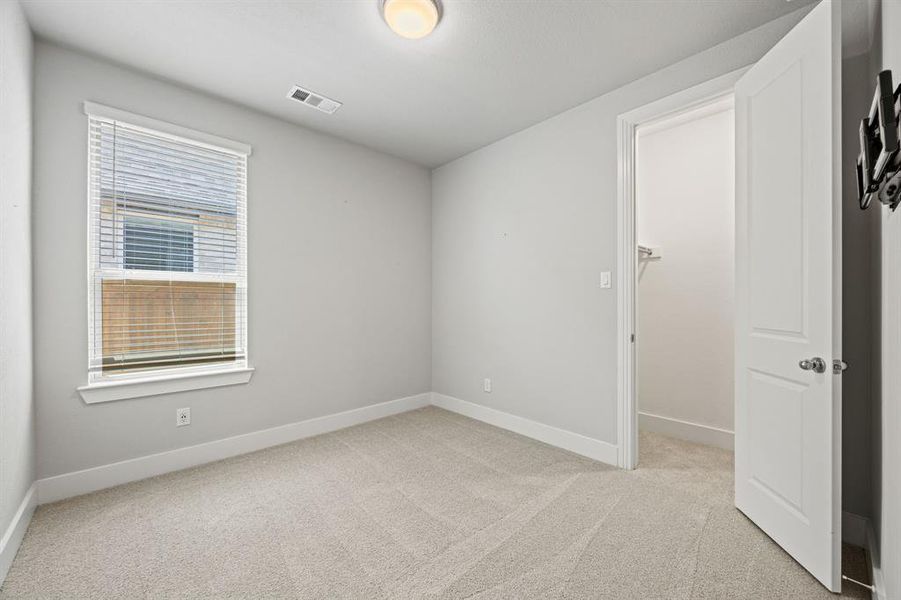 GUEST BEDROOM WITH WALK IN CLOSET GUEST BEDROOM WITH WALK IN CLOSET