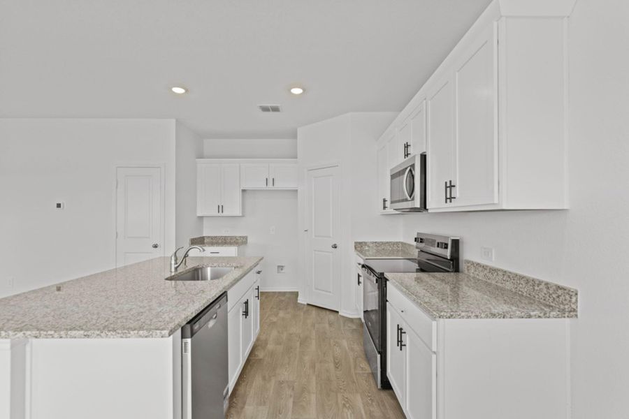 Furnished interior view inside a new home in Palomino, Manor (Image 8).