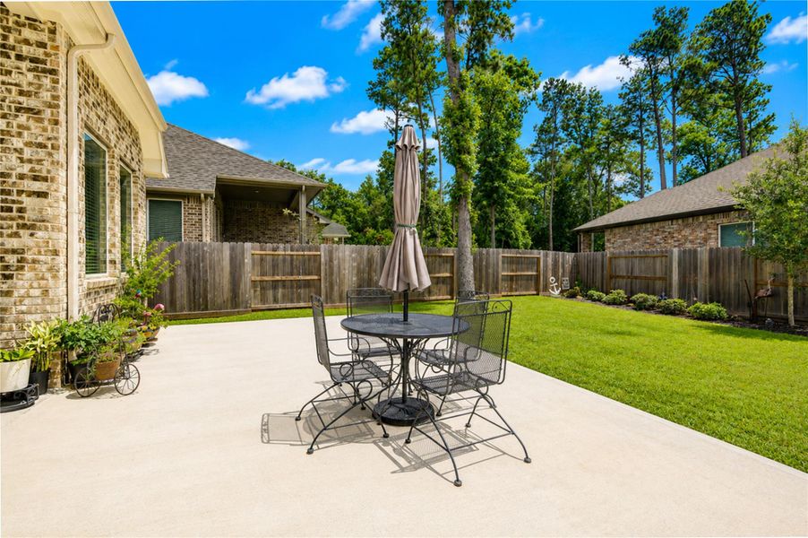 The backyard offers plenty of open space for outdoor dining, play, or entertaining. The backyard offers plenty of open space for outdoor dining, play, or entertaining.