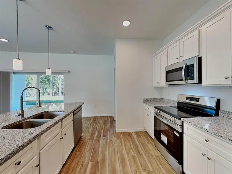 Furnished interior view inside a new home in , Port Charlotte (Image 4).