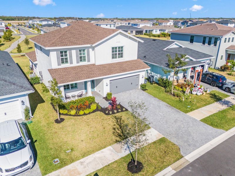 Front exterior of a new home in , Loxahatchee, FL, highlighting curb appeal (Image 26).